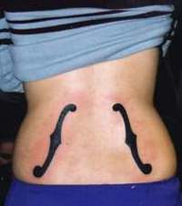 F holes tattoo