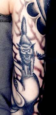 Verna's arm tattoo - black cat