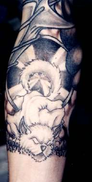 Verna's arm tattoo - white cat